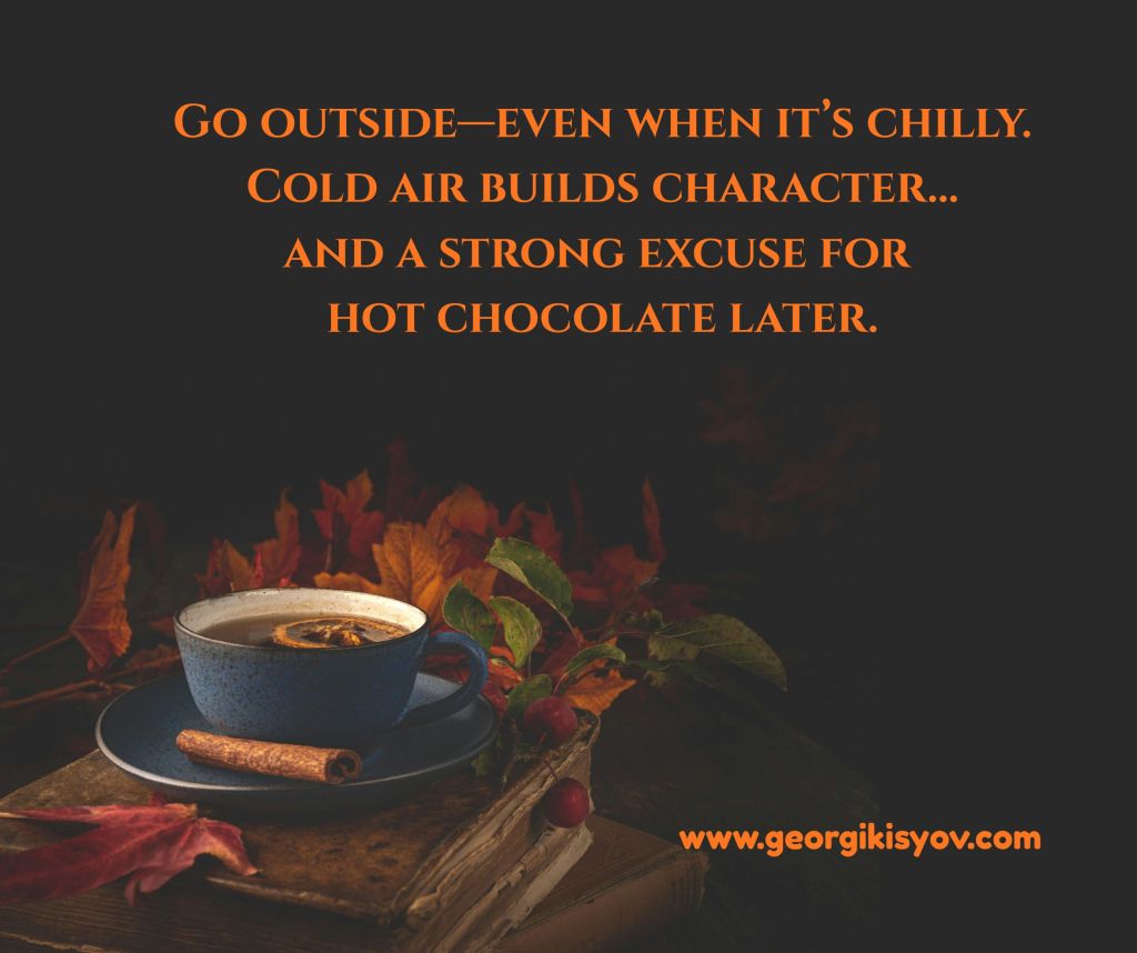 Cozy autumn background with tea, cinnamon, and a funny quote about chilly weather, character building, and hot chocolate.